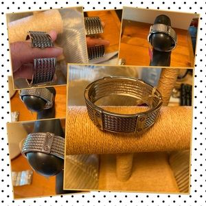 A very cool silver hinged bracelet!